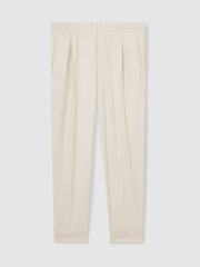 Men Relaxed-Fit Pleated Tapered Trousers in Ecru