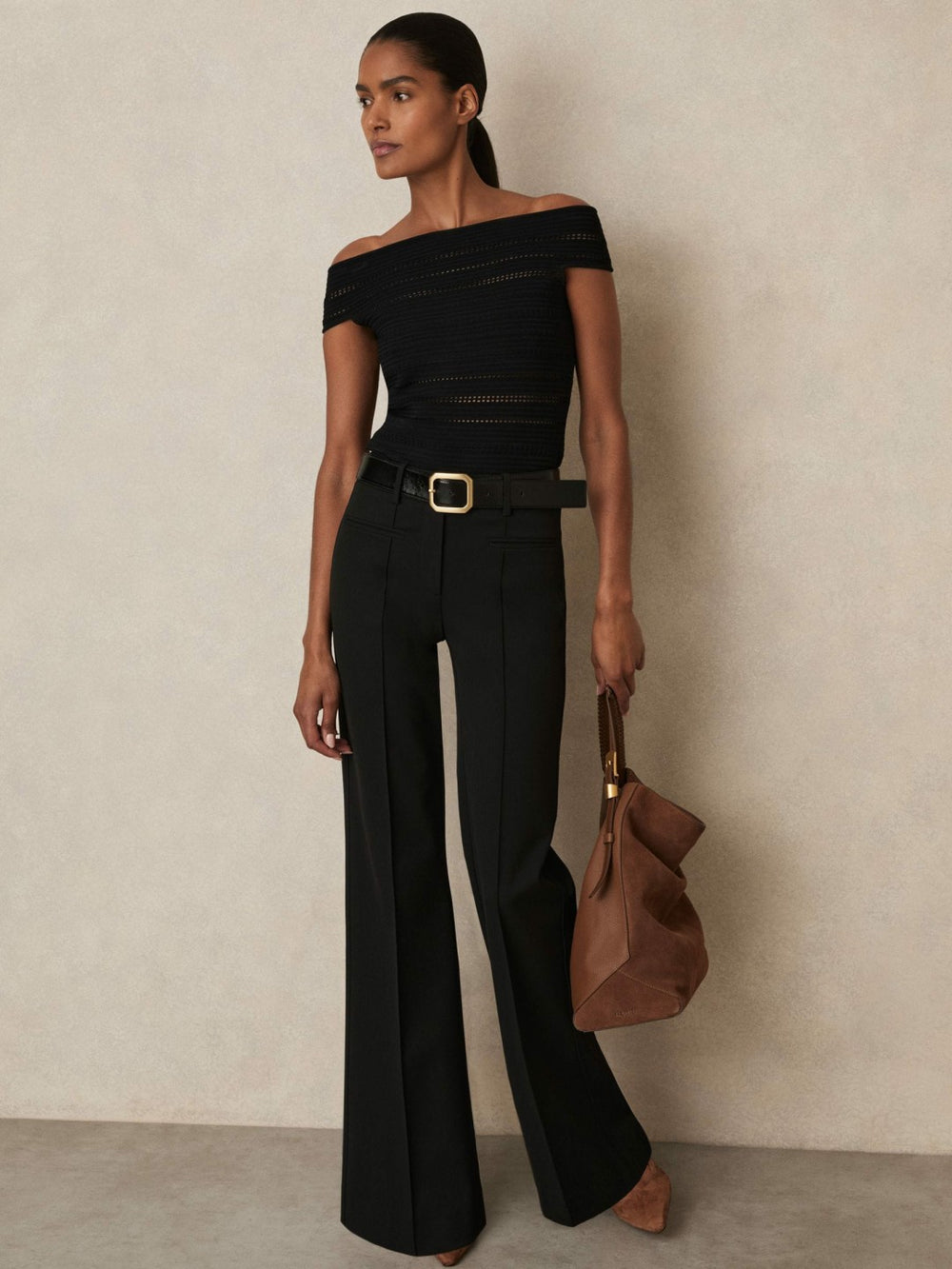 Women High Rise Flared Trousers in Black