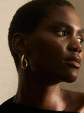 Women Wave Hoop Earrings in Gold Tone
