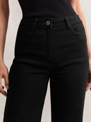 Women Petite Mid-Rise Flared Jeans in Black