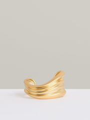 Women Fluid Sculpted Cuff in Gold Tone