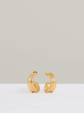 Women Fluid Hoop Earrings in Gold Tone