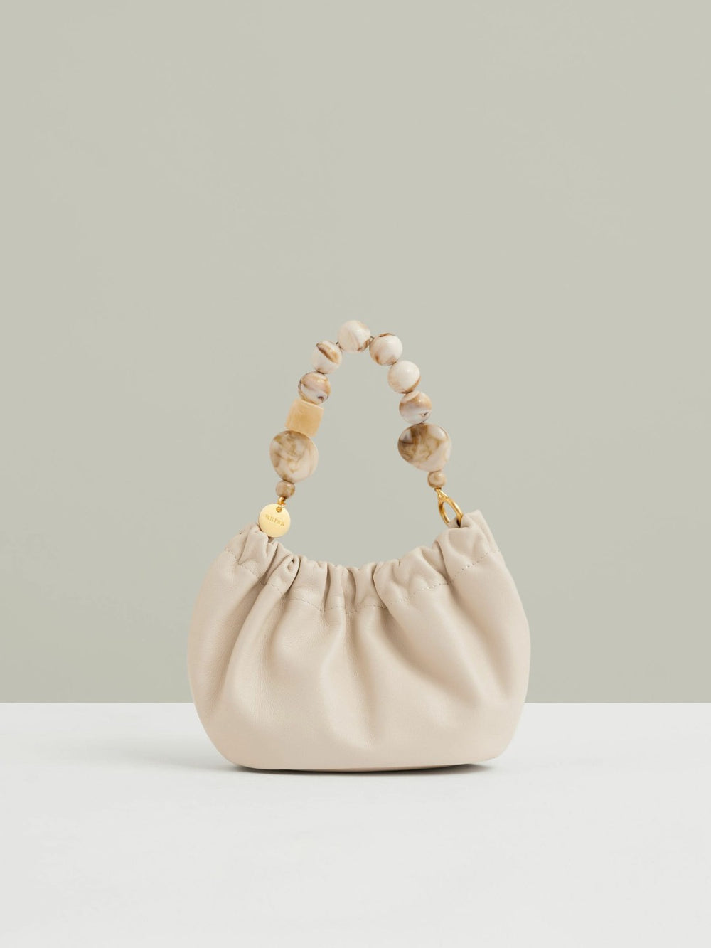 Women Leather Bead-Handle Pouch Bag in Off White