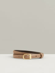 Women Leather Curved-Buckle Skinny Belt in Taupe