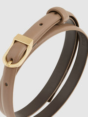 Women Leather Curved-Buckle Skinny Belt in Taupe