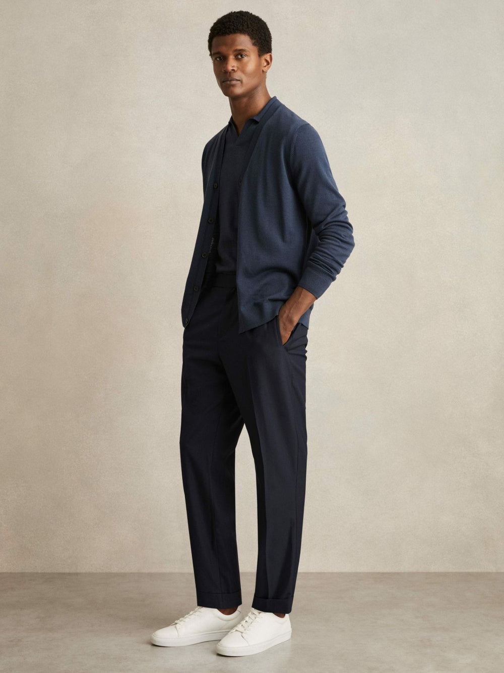 Men Relaxed-Fit Pleated Tapered Trousers in Navy