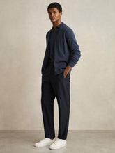 Men Relaxed-Fit Pleated Tapered Trousers in Navy