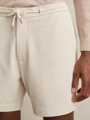 Men Textured Drawstring Shorts in Stone