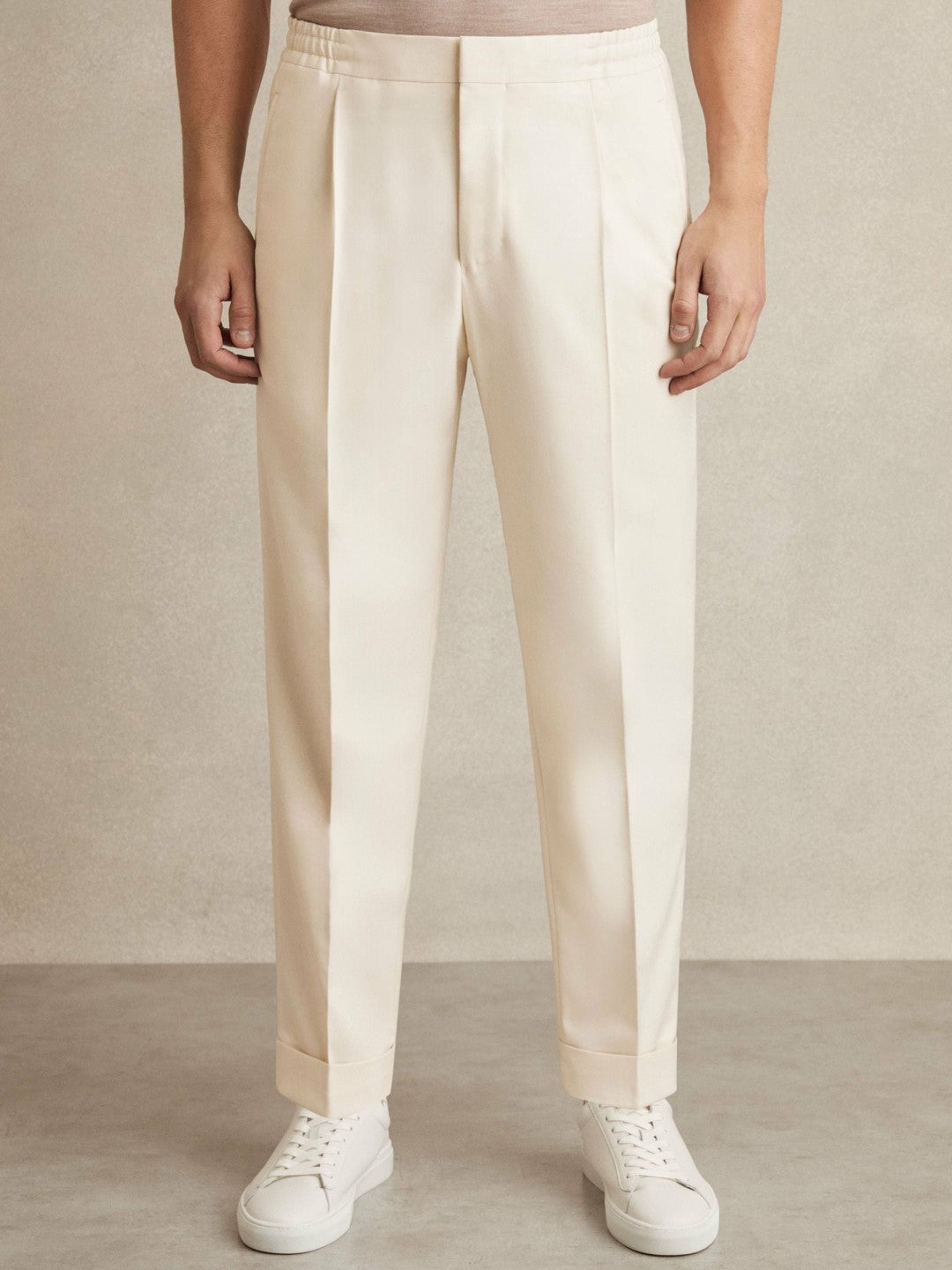 Men Relaxed-Fit Pleated Tapered Trousers in Ecru