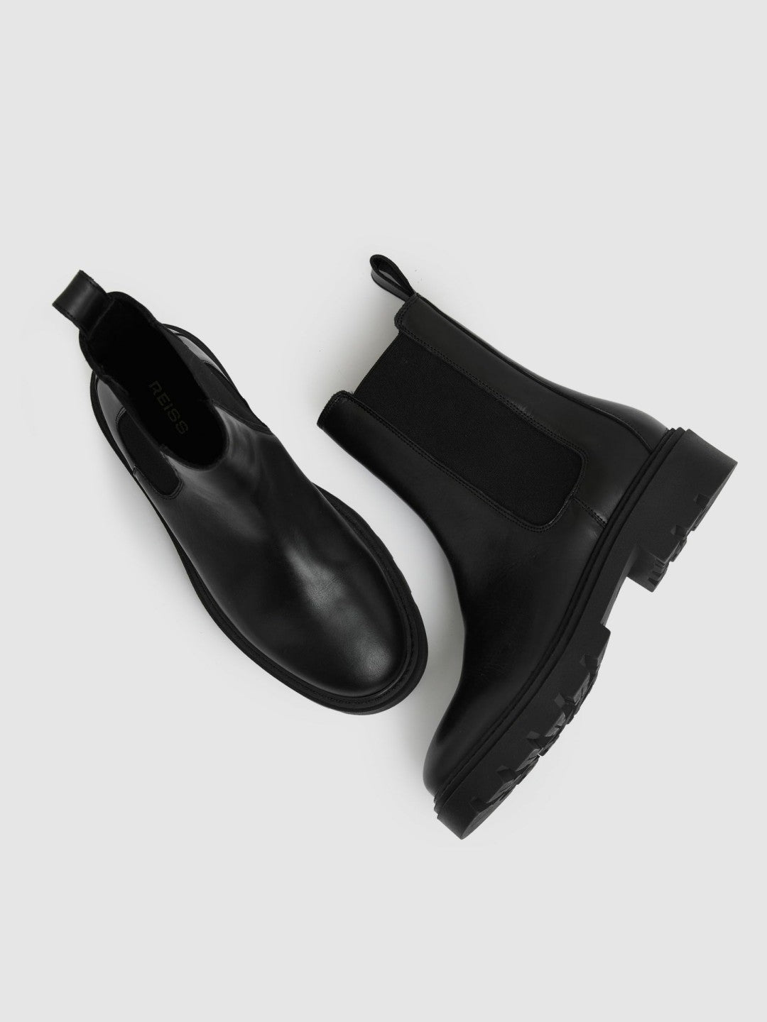 Women Leather Cleated Sole Chelsea Boots in Black