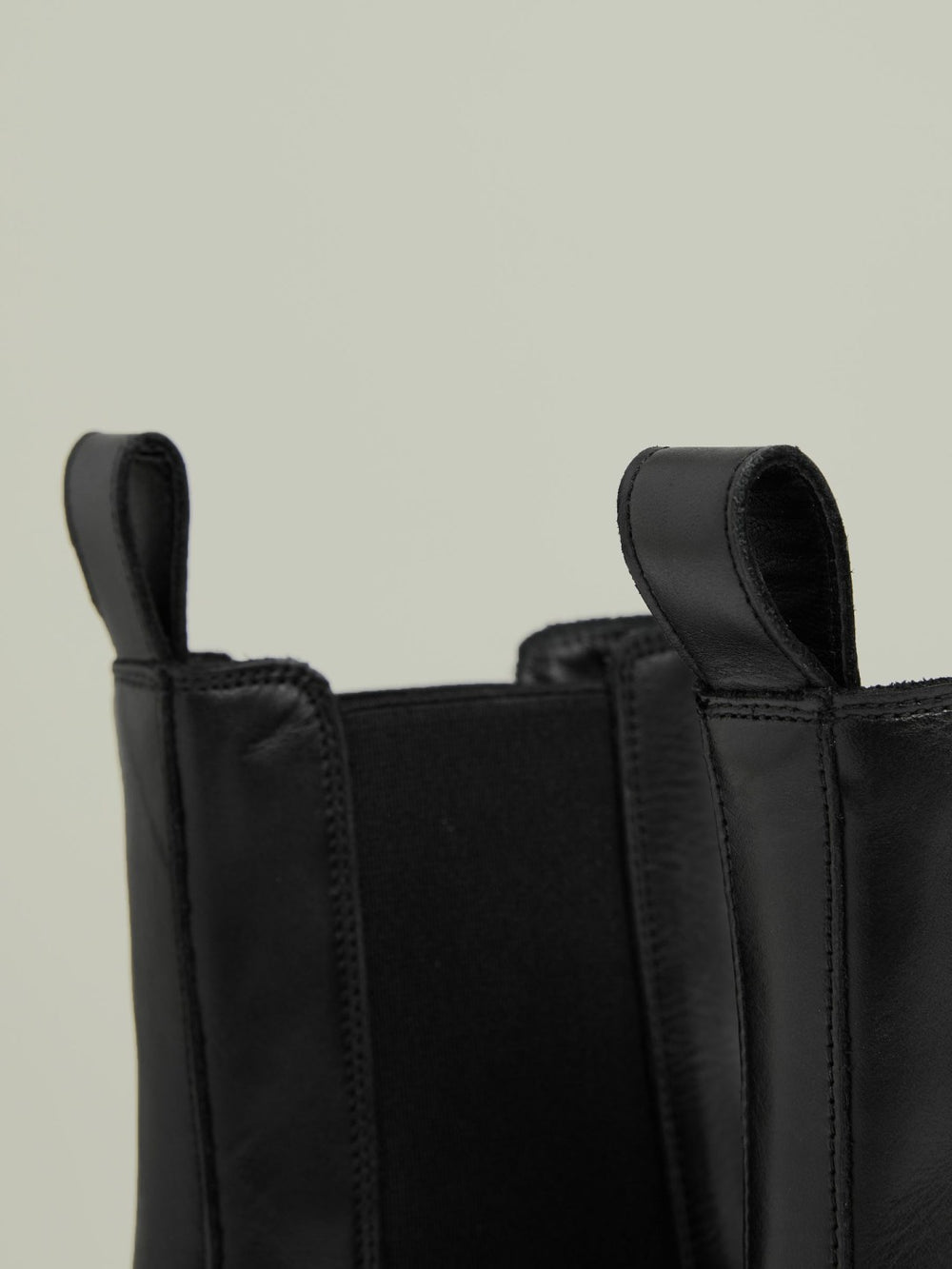Women Leather Cleated Sole Chelsea Boots in Black