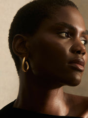 Women Wave Hoop Earrings in Gold Tone