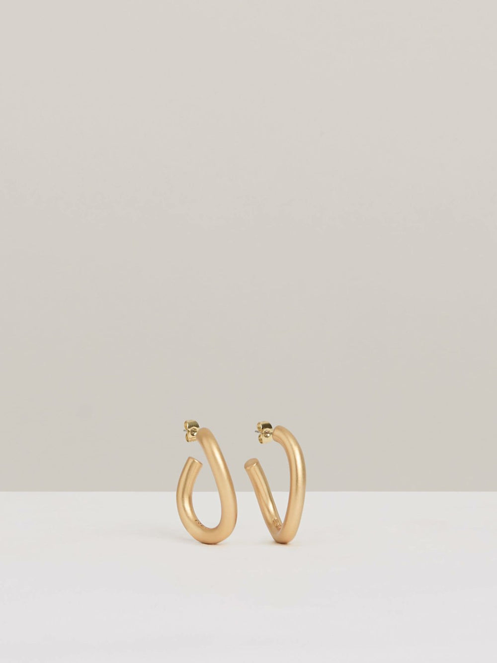 Women Wave Hoop Earrings in Gold Tone