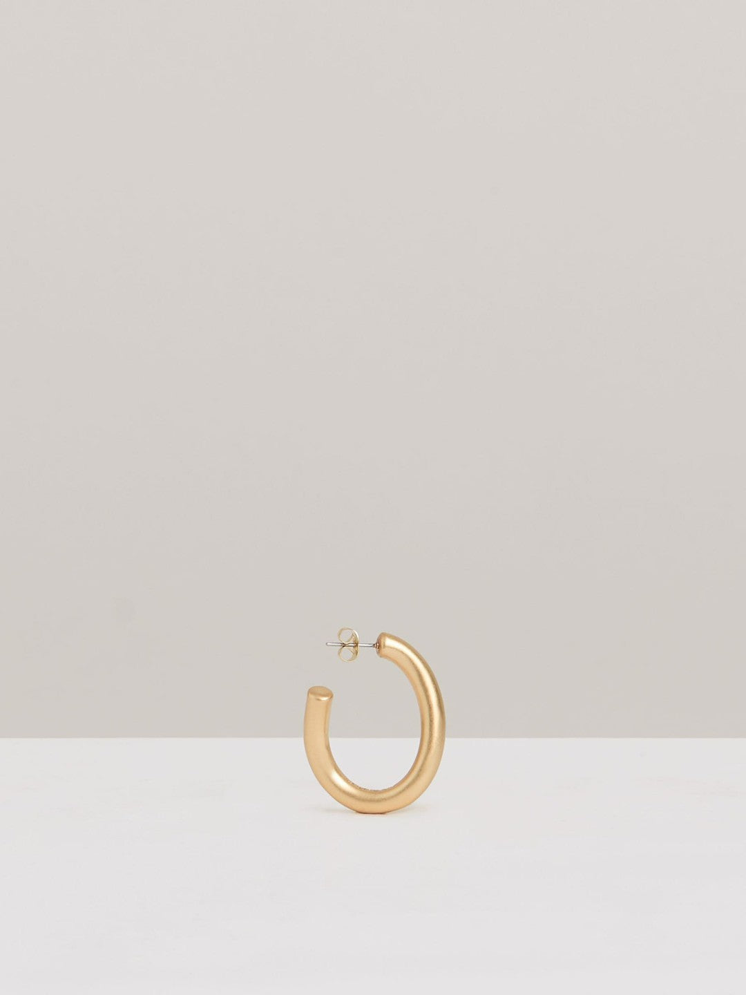 Women Wave Hoop Earrings in Gold Tone