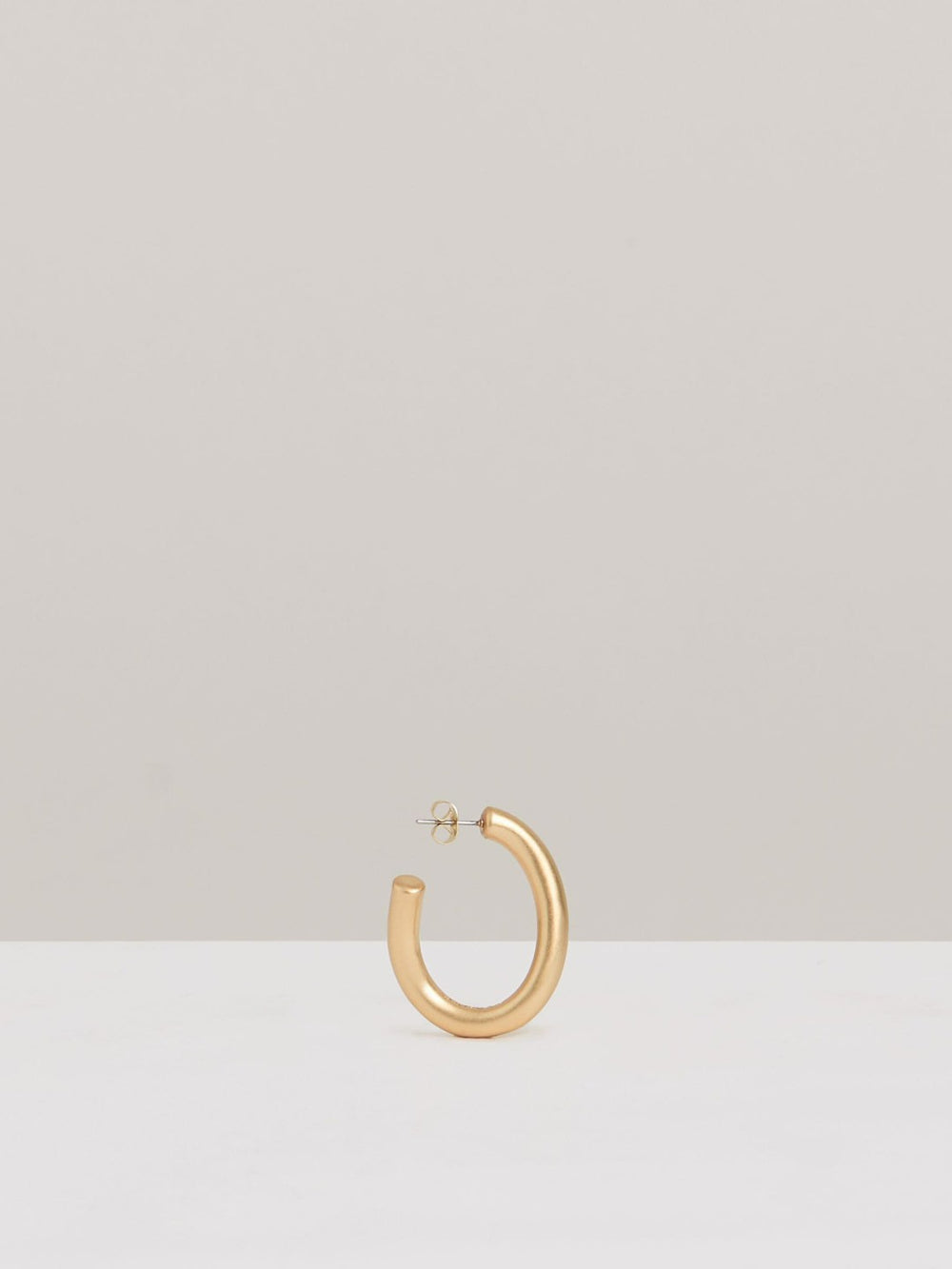Women Wave Hoop Earrings in Gold Tone