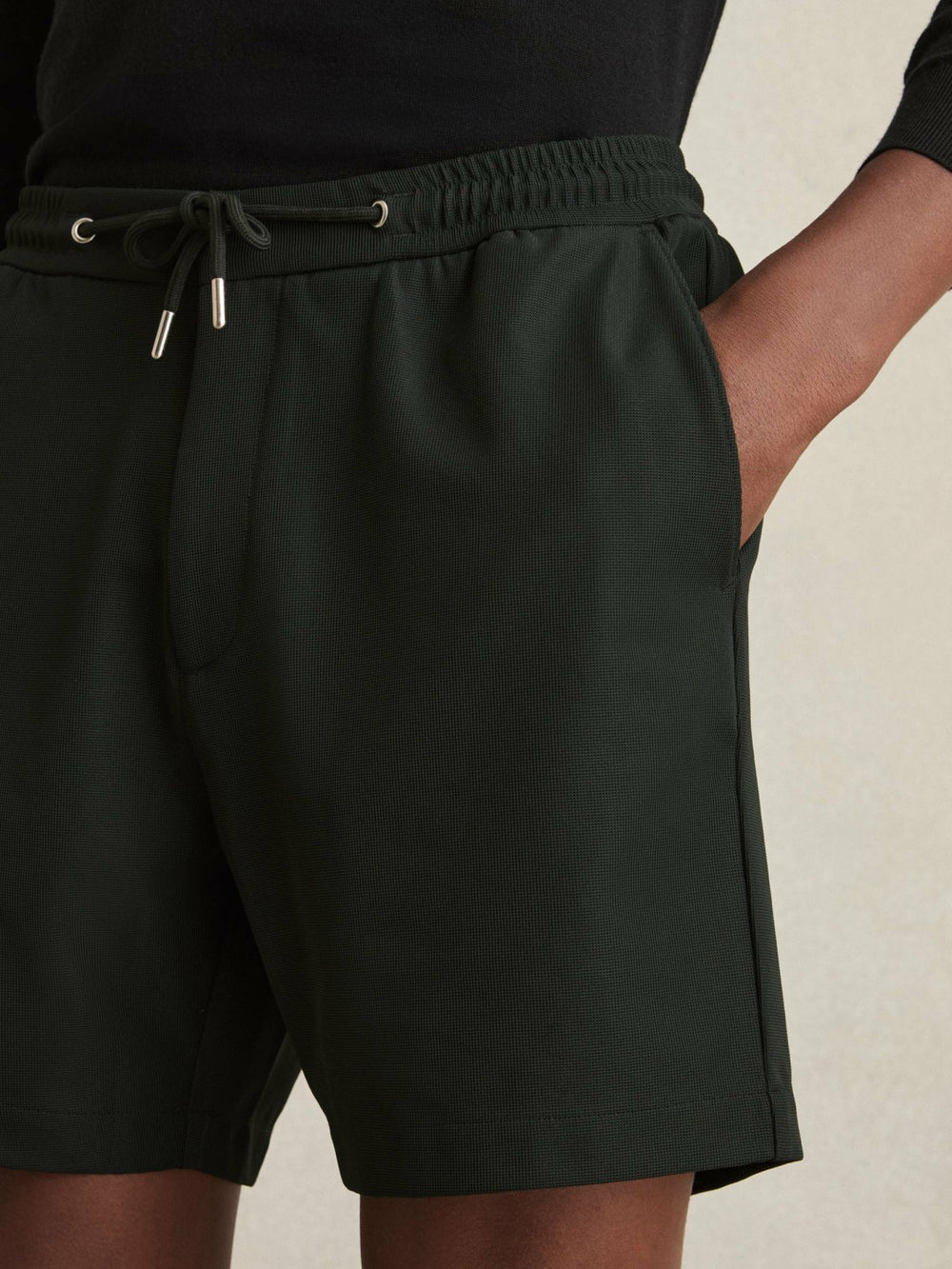 Men Textured Drawstring Shorts in Dark Green
