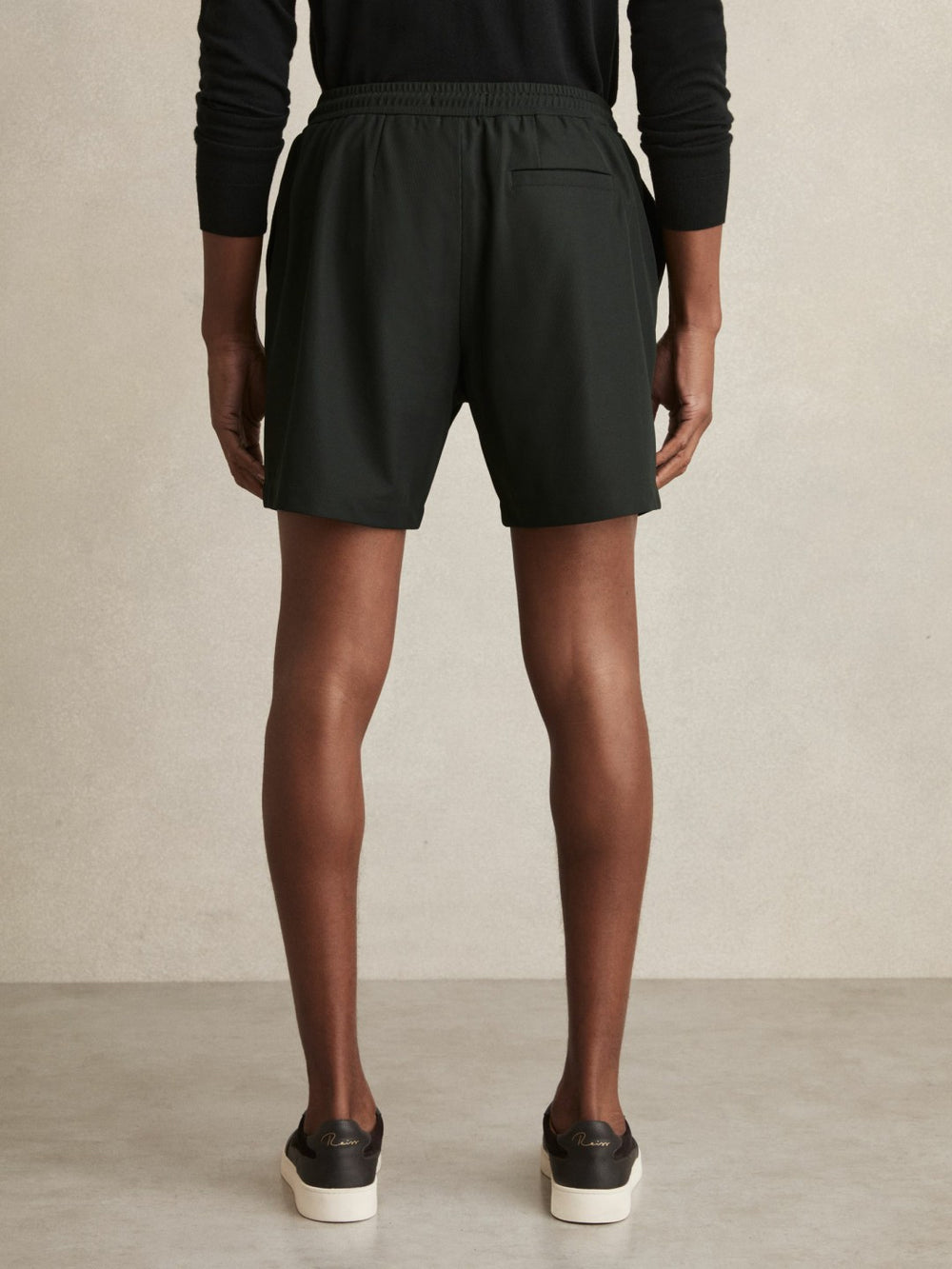 Men Textured Drawstring Shorts in Dark Green