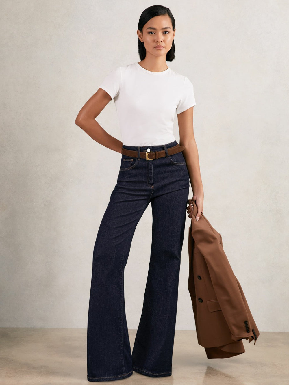 Women Petite Mid-Rise Flared Jeans in Dark Blue