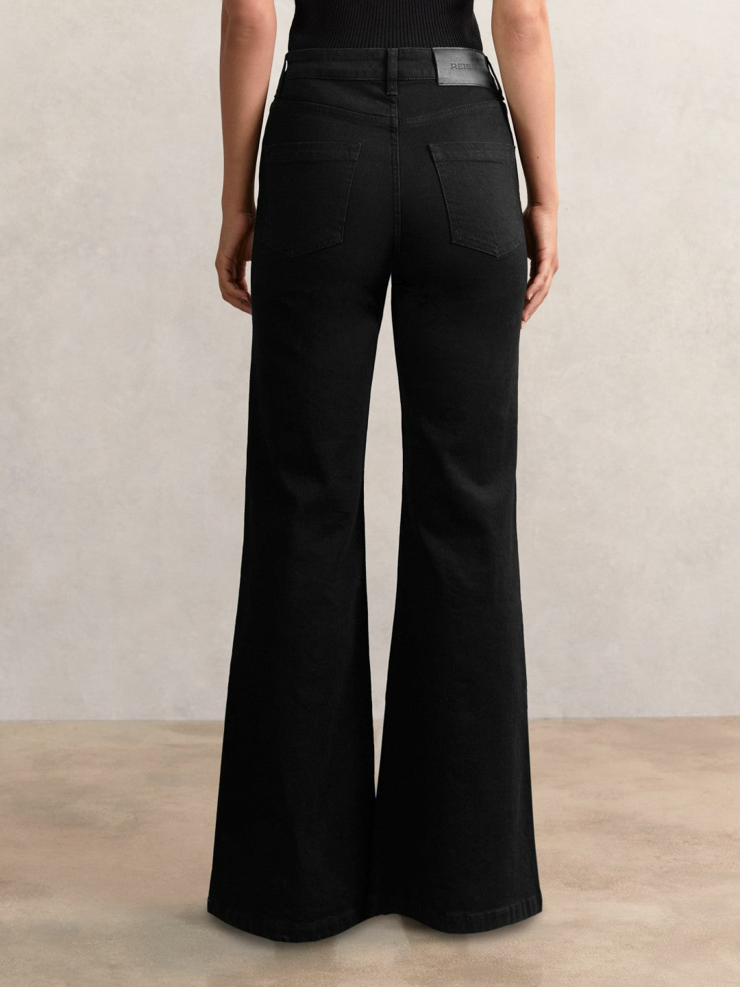 Women Petite Mid-Rise Flared Jeans in Black