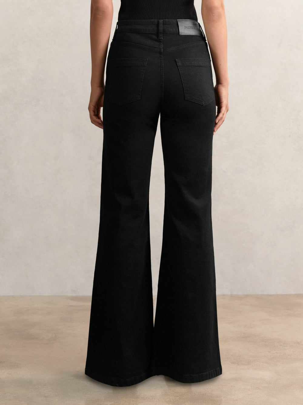 Women Petite Mid-Rise Flared Jeans in Black