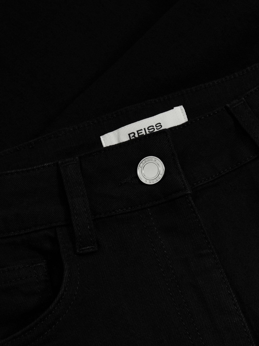 Women Petite Mid-Rise Flared Jeans in Black