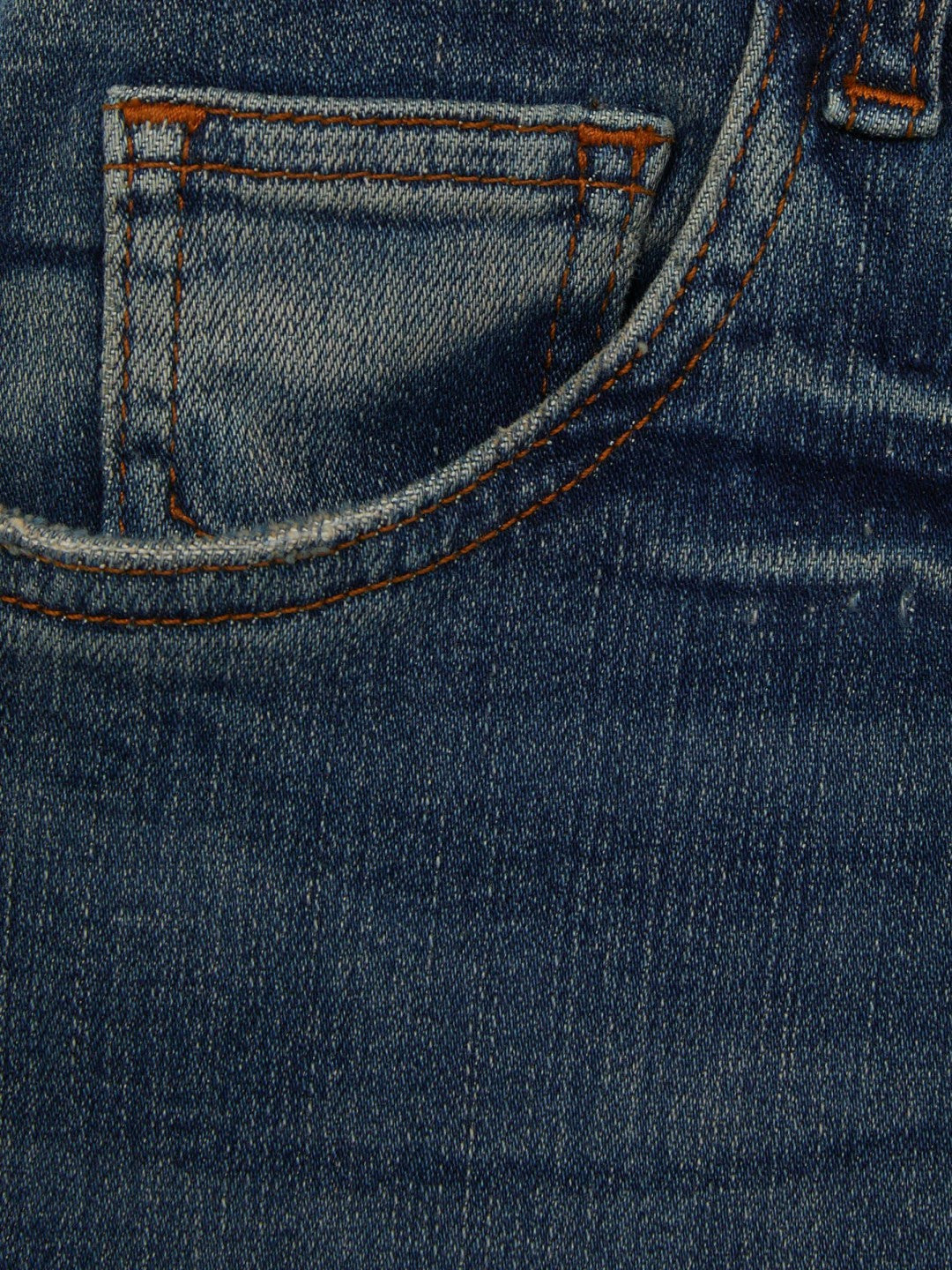 Women Petite Mid-Rise Flared Jeans in Mid Blue