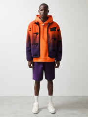 Men Unisex Fit McLaren F1 Team Ombré Fleece Jacket in Papaya Orange/Purple