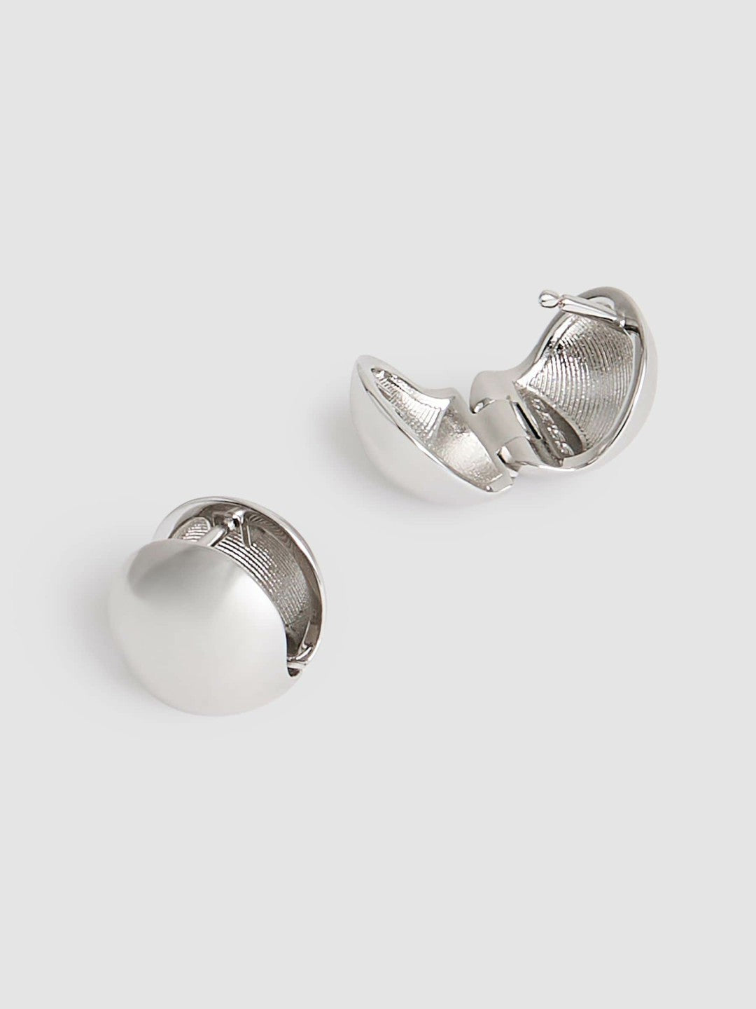 Women Polished Ball Huggie Earrings in Silver Tone