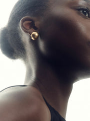 Women Polished Ball Huggie Earrings in Gold