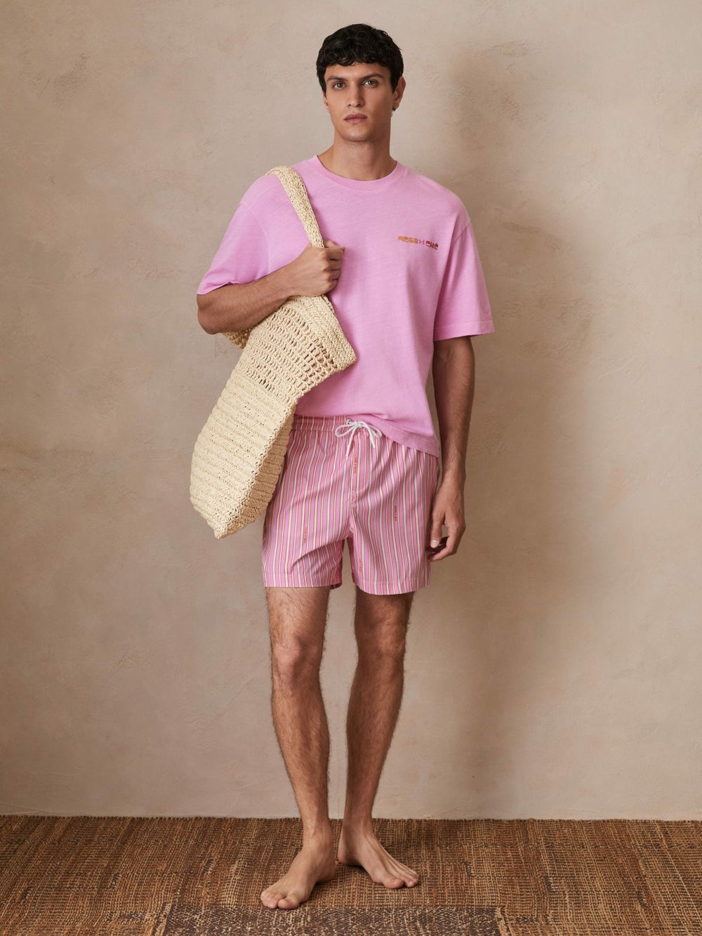 Men | Ché Stripe Swim Shorts in Pink/White
