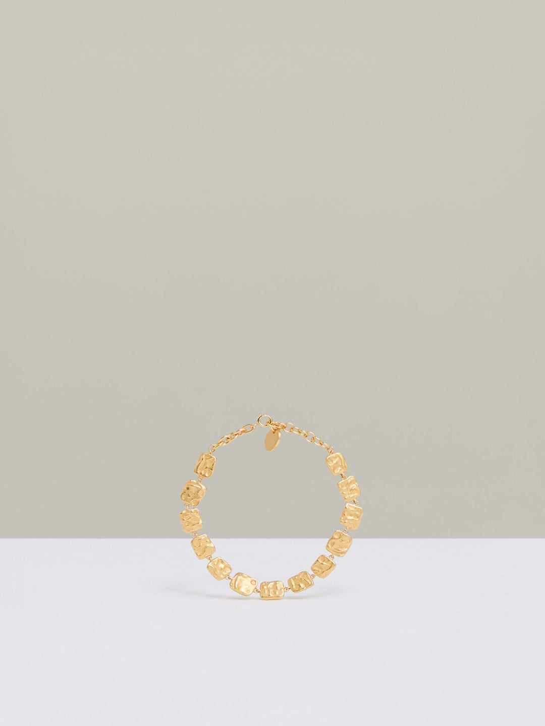 Women Molten Square Bracelet in Gold Tone