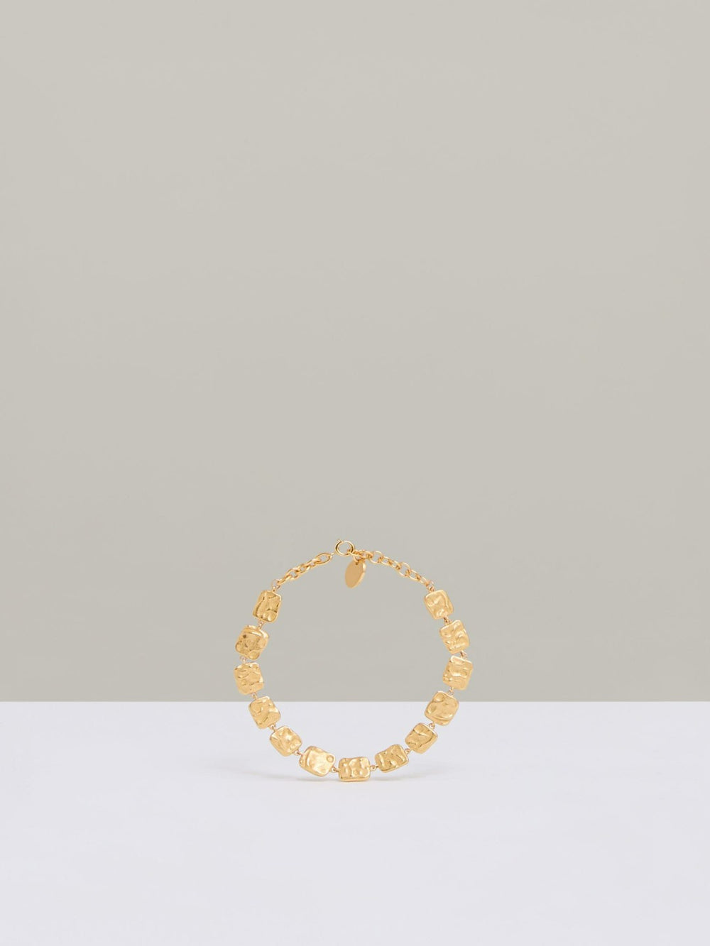 Women Molten Square Bracelet in Gold Tone