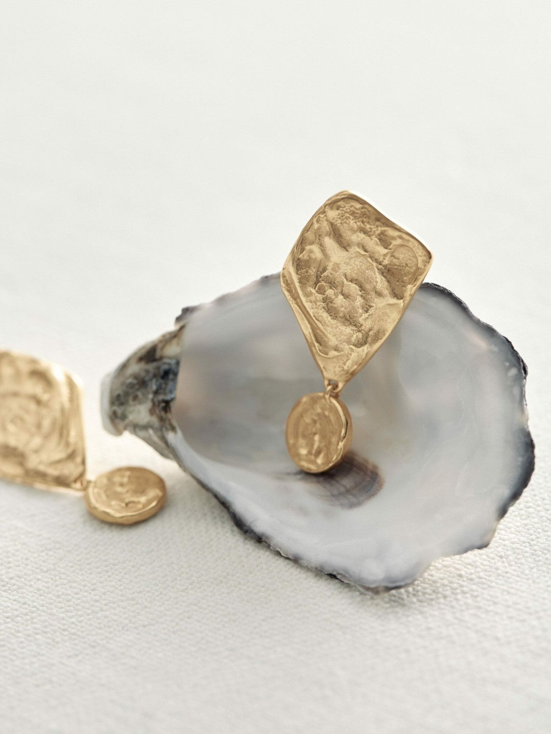 Women Molten Large Drop Earrings in Gold Tone