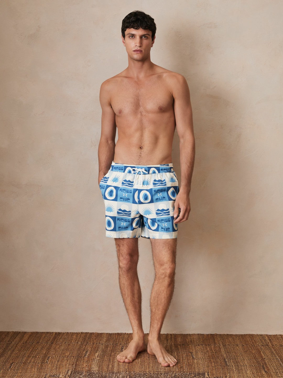Men | Ché Sunset-Print Swim Shorts in Blue Multi