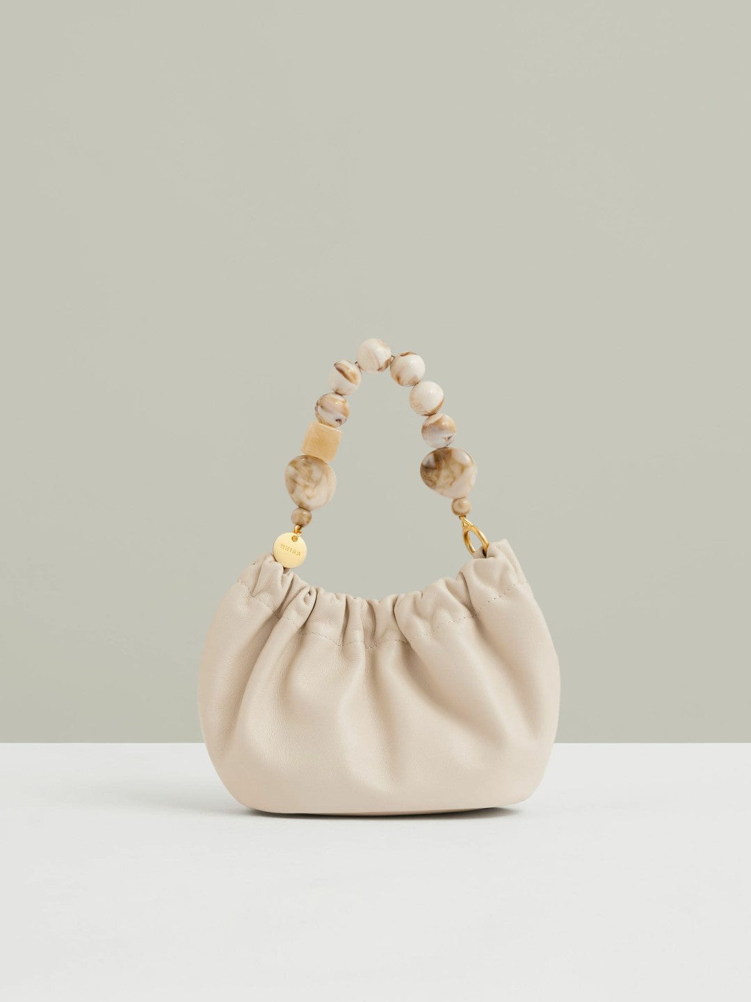 Women Leather Bead-Handle Pouch Bag in Off White
