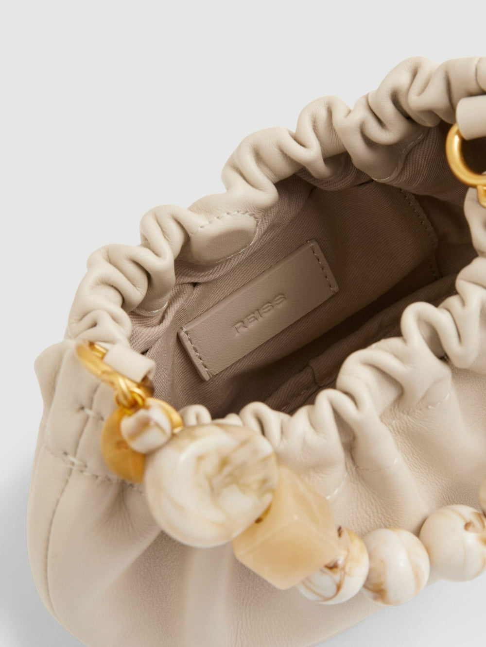 Women Leather Bead-Handle Pouch Bag in Off White