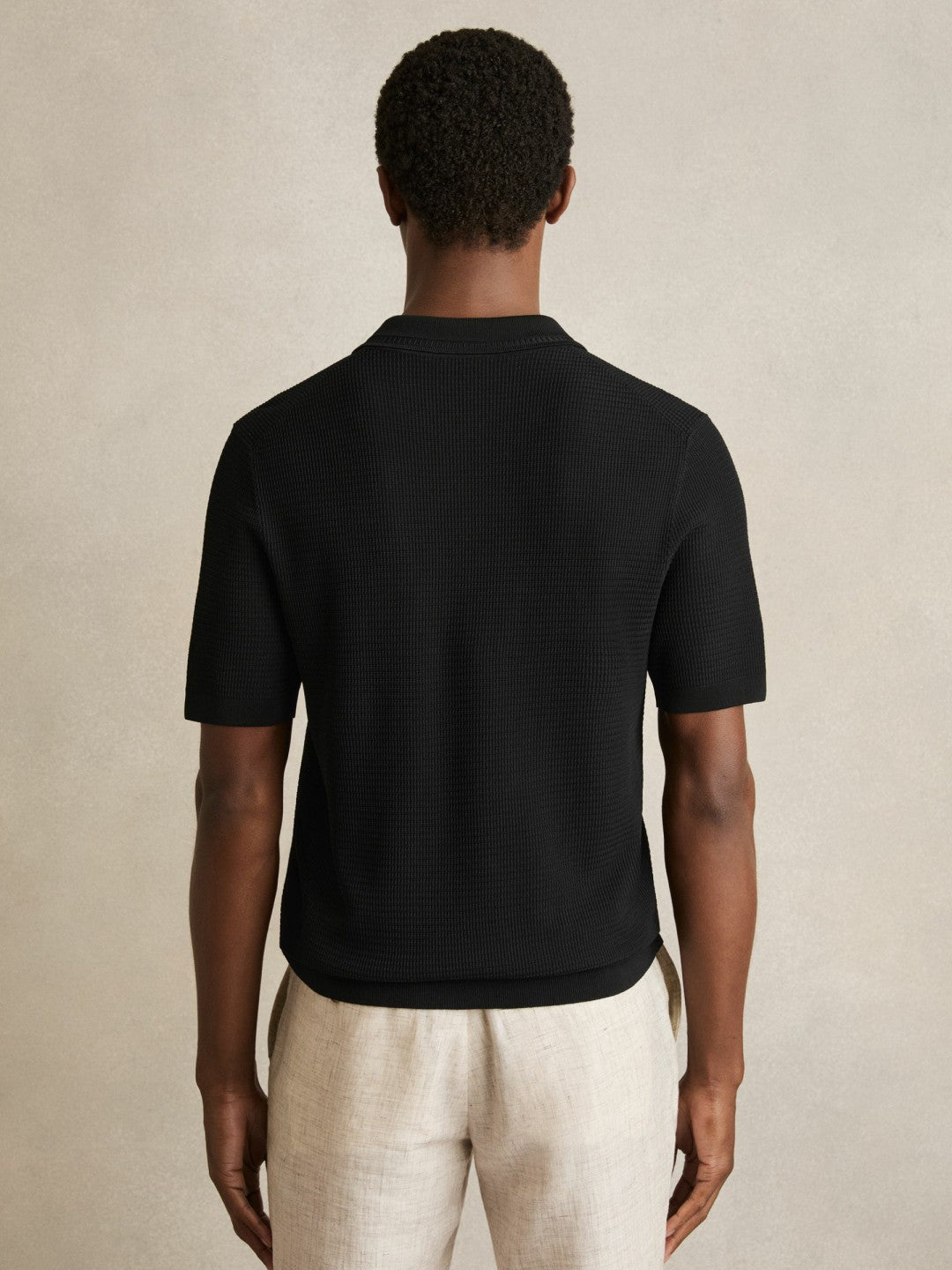 Men Textured Half-Zip Polo Shirt in Black