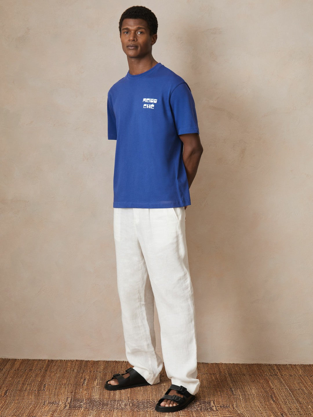 Men | Ché Cotton Palm-Print T-Shirt in Blue