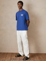 Men | Ché Cotton Palm-Print T-Shirt in Blue