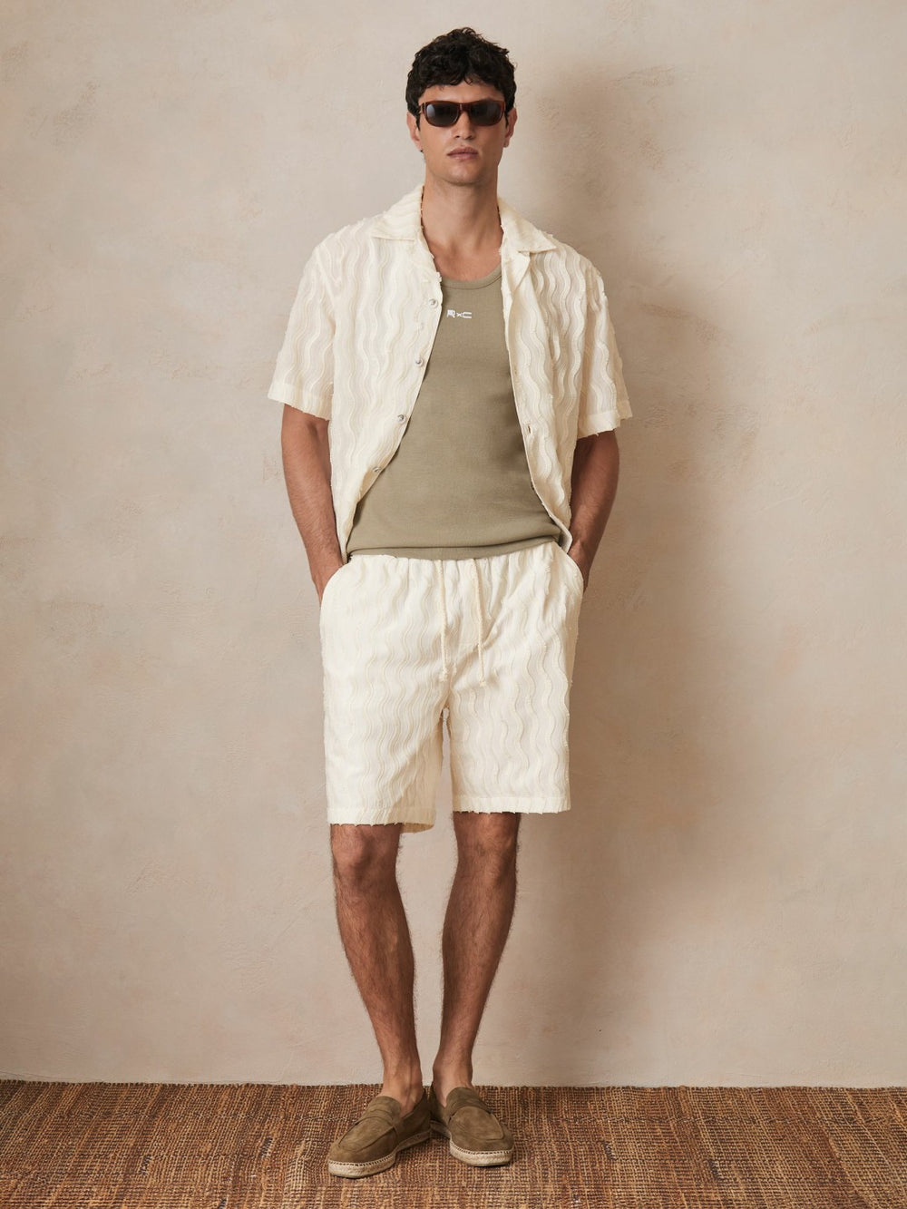 Men | Ché Fringed-Wave Shorts in Off White