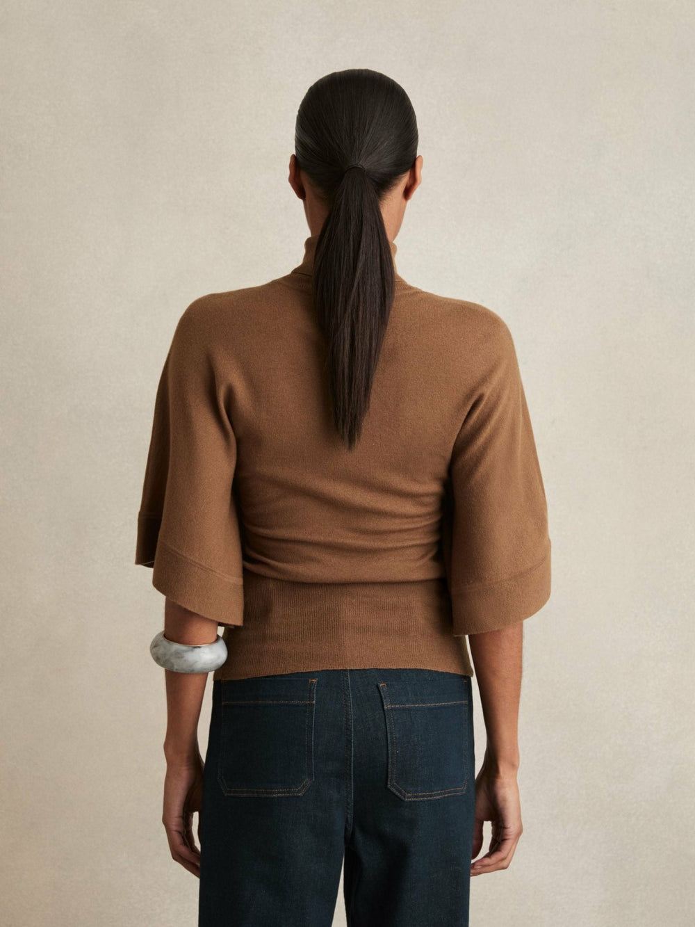 Women Merino Wool Batwing Roll-Neck Jumper in Tan
