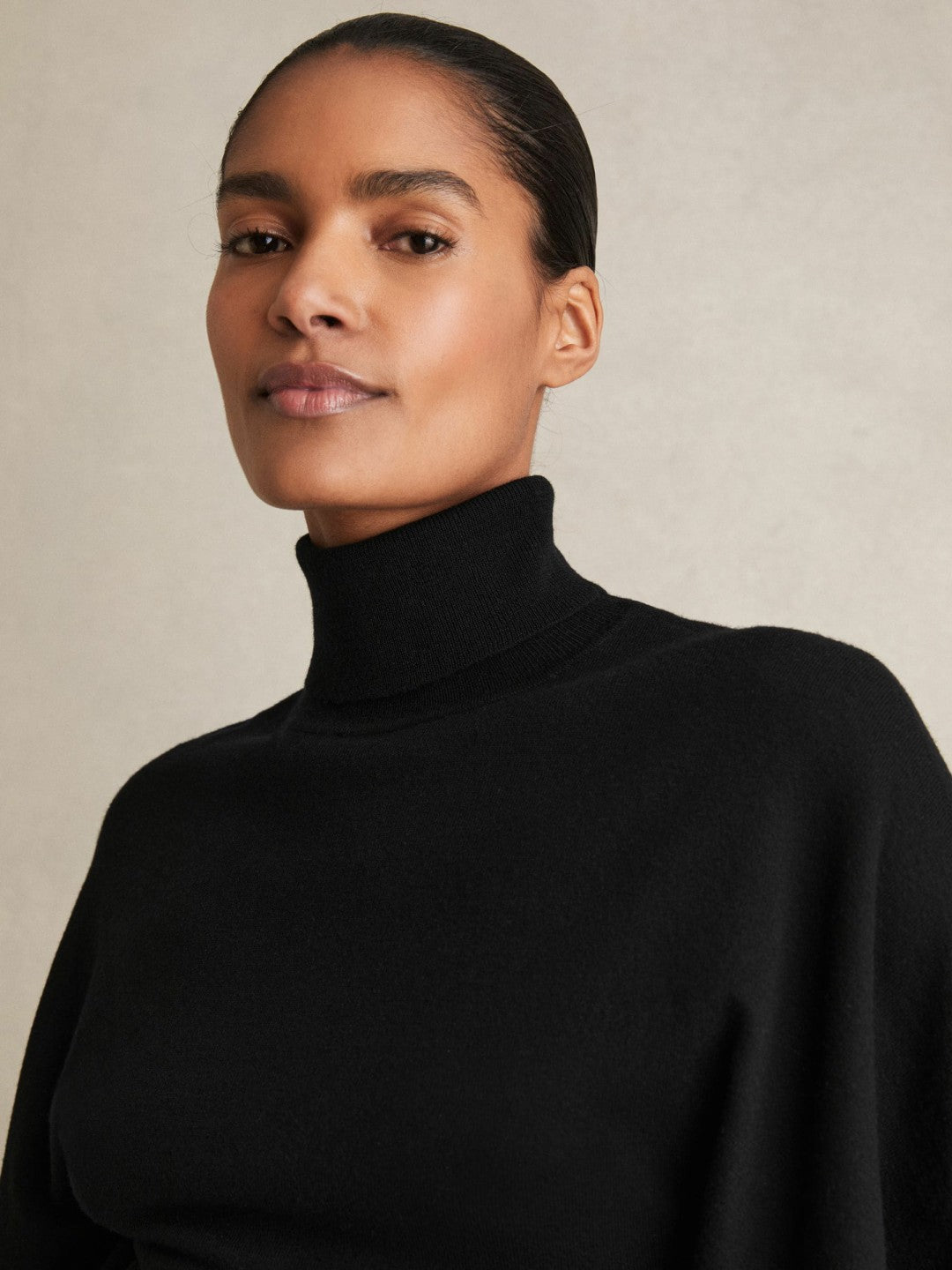 Women Merino Wool Batwing Roll-Neck Jumper in Black