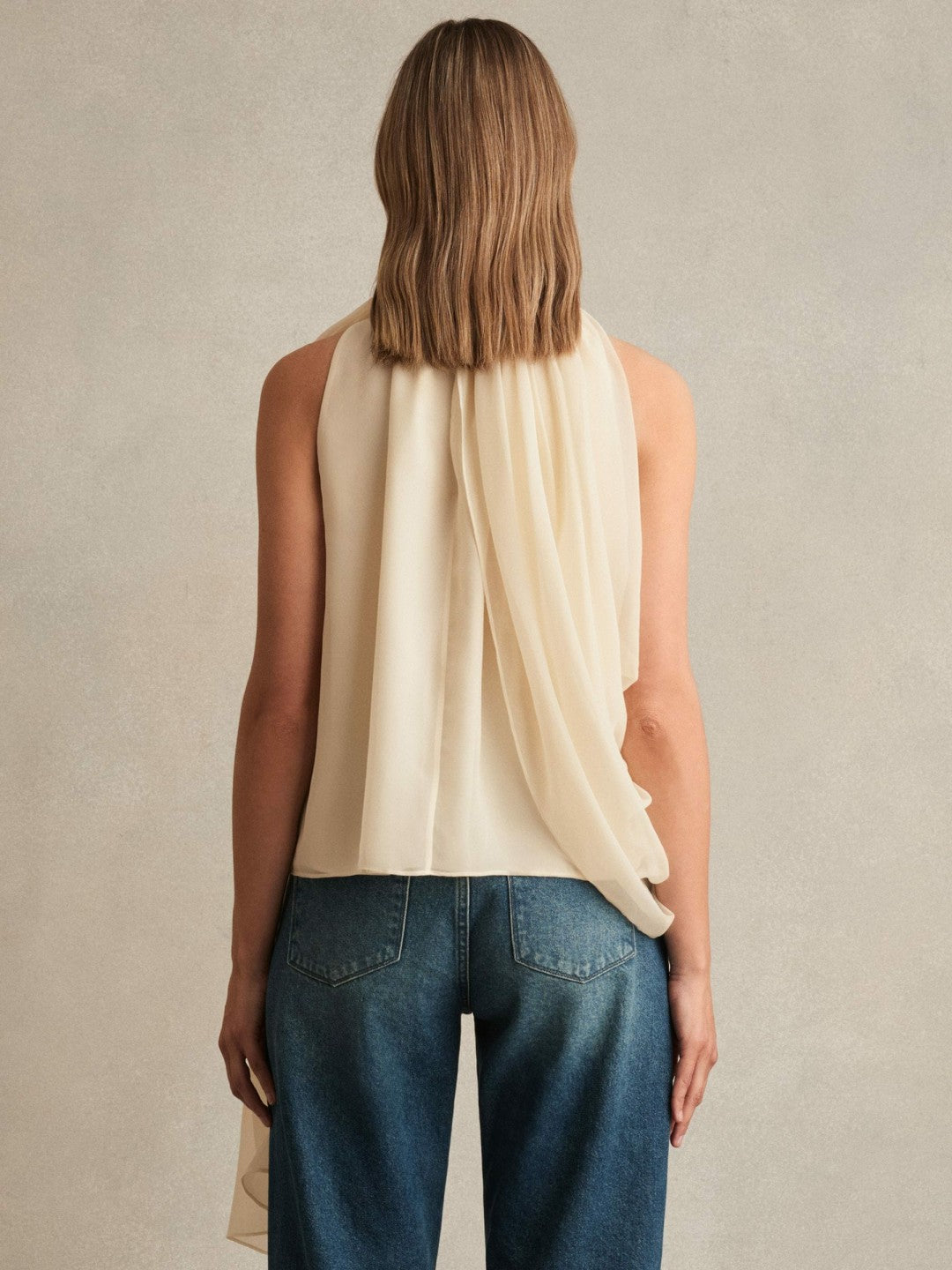 Women Draped Chiffon Sleeveless Top in Ivory