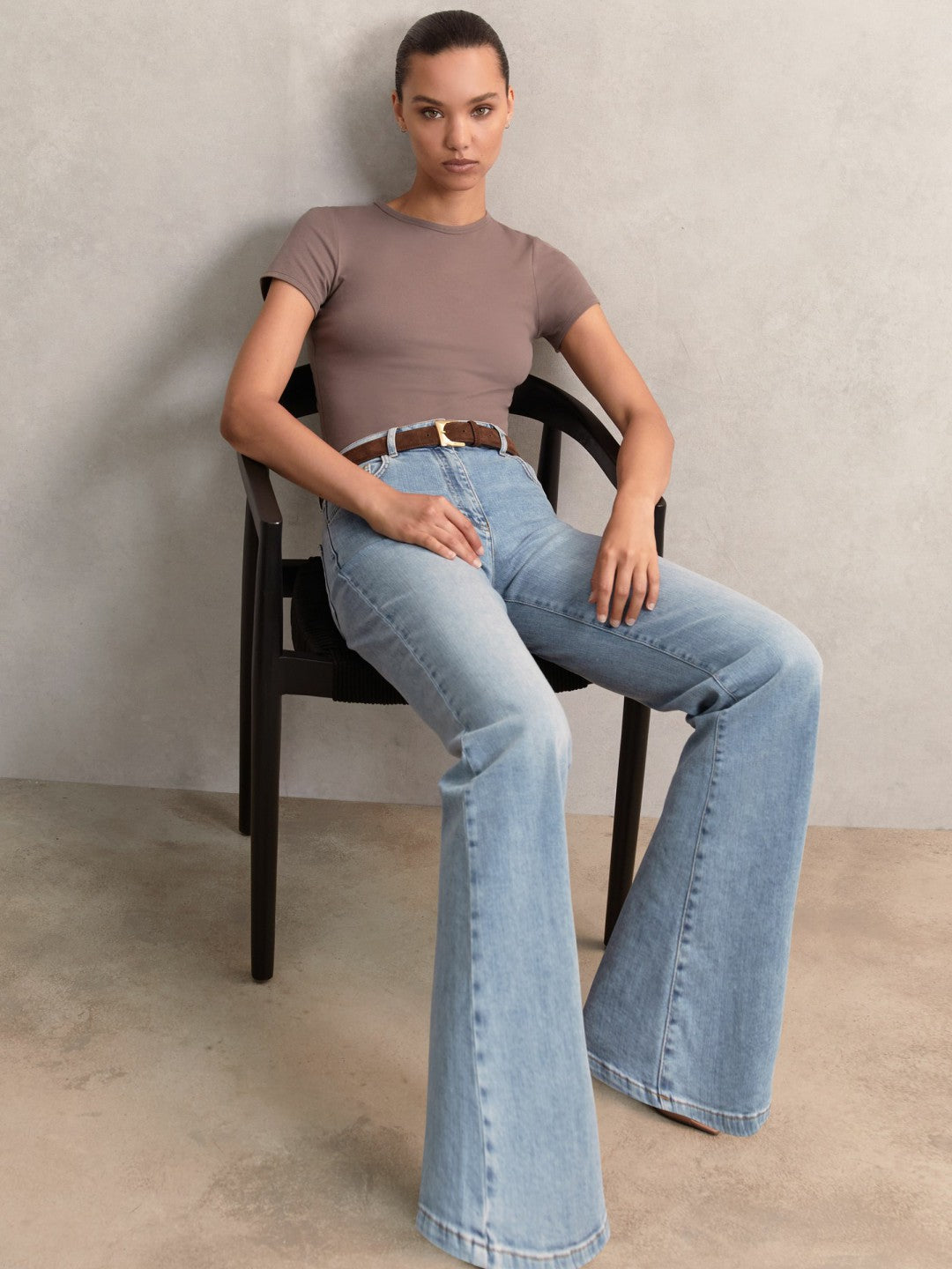 Women Petite Mid-Rise Flared Jeans in Light Blue