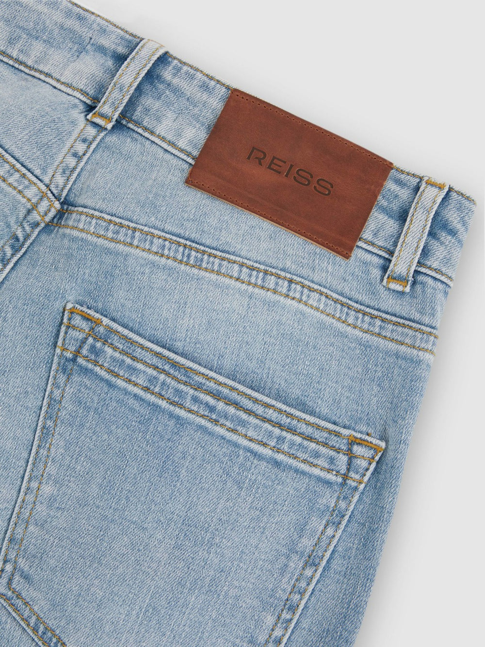 Women Petite Mid-Rise Flared Jeans in Light Blue