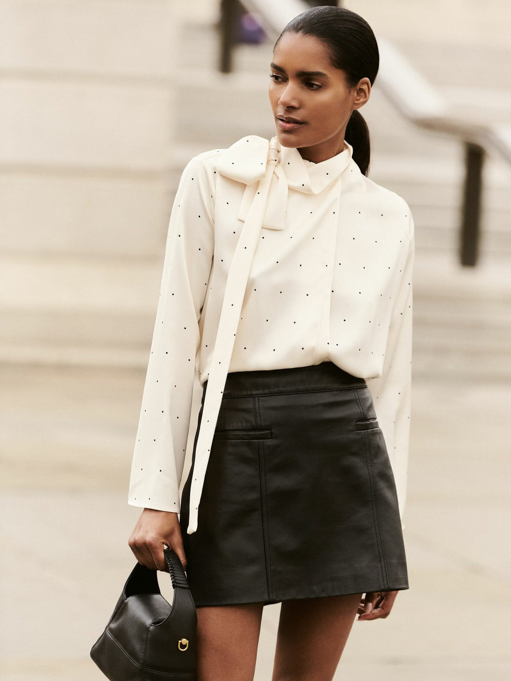Women Leather Welt-Pocket Mini Skirt in Black