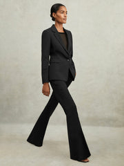 Women Wool-Blend Tailored Flared Suit Trousers in Black