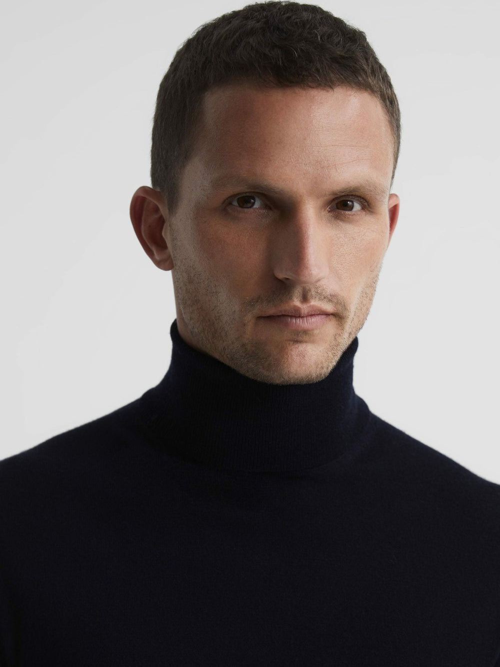 Men Slim Fit Merino Wool Roll Neck Jumper in Navy