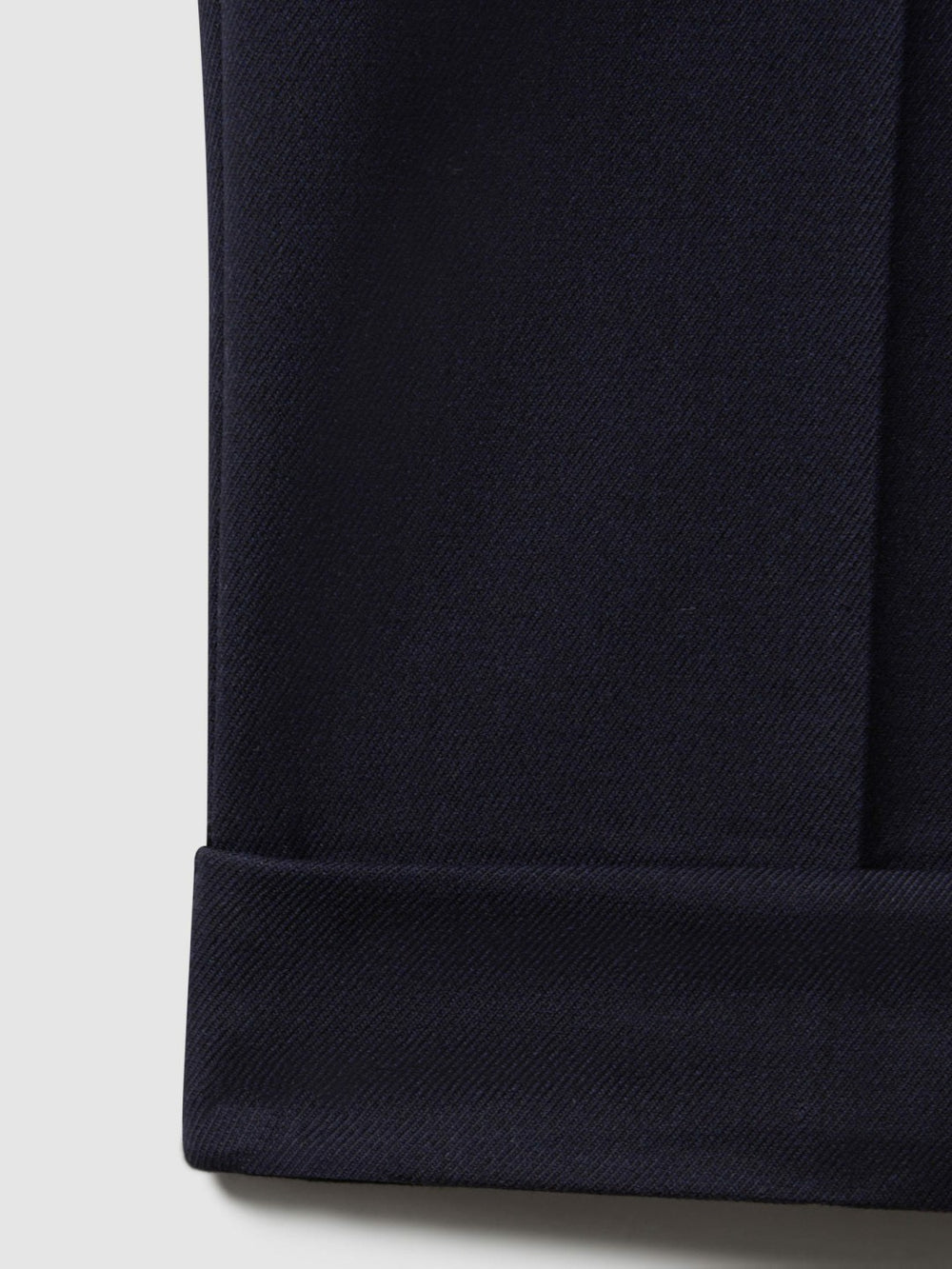 Men Relaxed-Fit Pleated Tapered Trousers in Navy