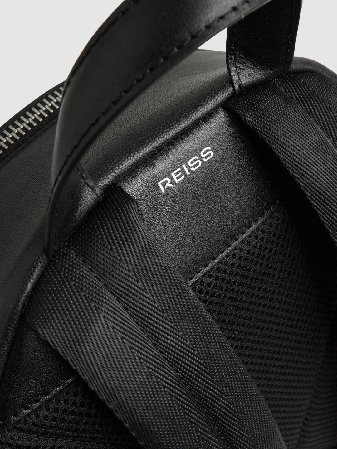 Men Micro-Grain Leather Backpack in Black
